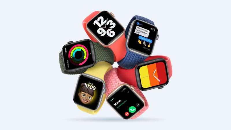 Group of first-generation Apple Watch SE models in gold, silver and space gray with colorful bands
