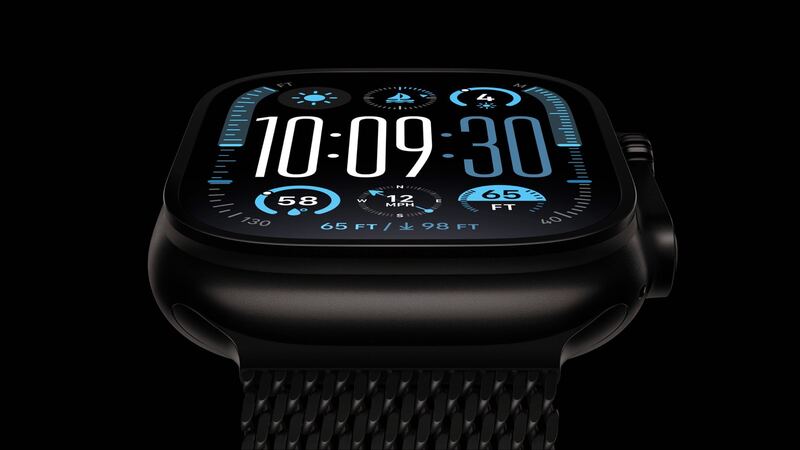 Apple Watch Ultra 2 in black titanium with a Titanium Milanese Loop, front view of the display
