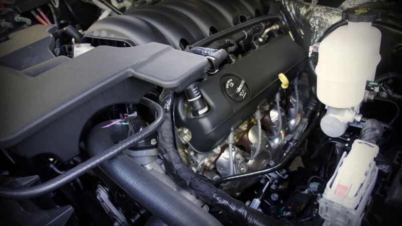 Engine bay of a 2015 GMC Yukon Denali, the Tahoe's twin, with the hood open