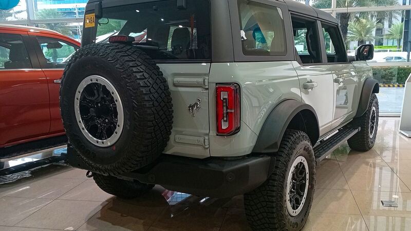 Cactus Gray 2024 Ford Bronco with the Sasquatch package, seen from the rear right
