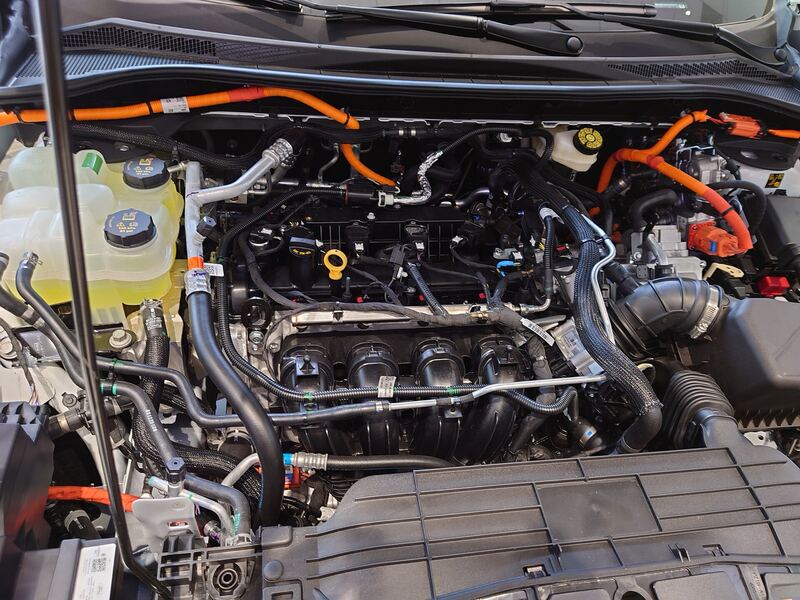 Engine bay of a 2024 Ford Escape plug-in hybrid with the 2.5-liter engine