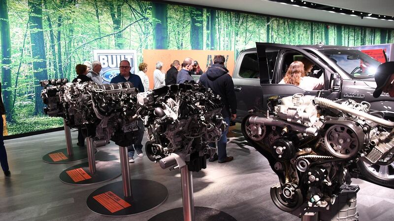 Ford EcoBoost truck engines and transmissions on display at an auto show