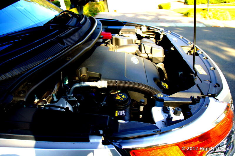 Side view of a 2011 Ford Explorer 3.5-liter V6 engine with the hood open