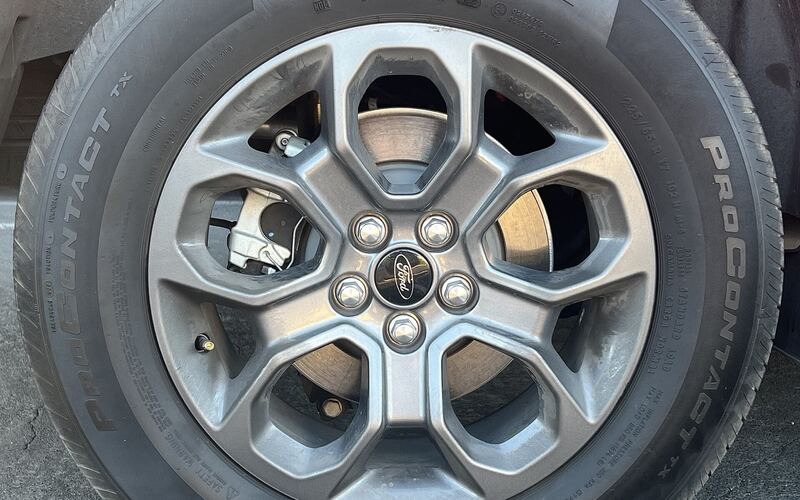 Ford alloy wheel with a Continental ProContact TX tire, close-up of the tread and sidewall