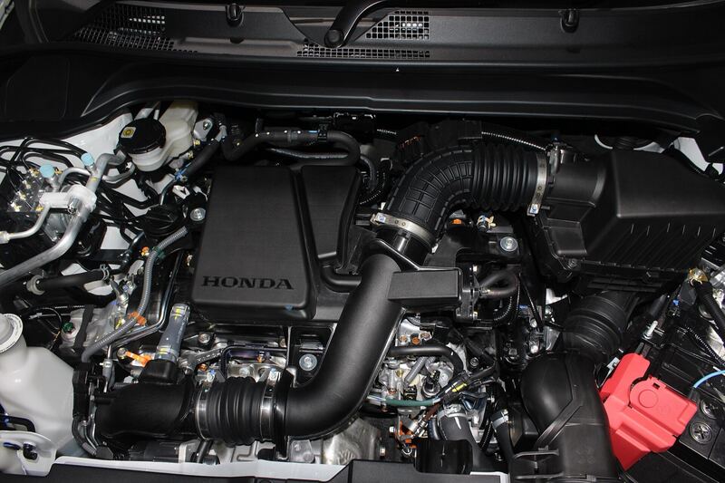 Engine bay of a third-generation Honda HR-V (international 1.5 turbo) with AC lines visible