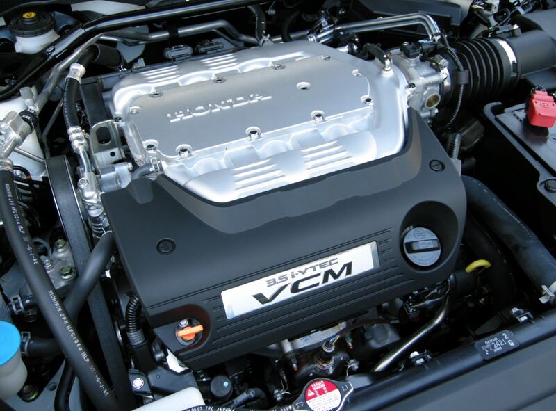 Hood up on a Honda with the 3.5-liter V6 engine, the same engine family as the Odyssey (similar vehicle)
