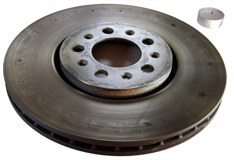 Cracked vented brake rotor removed from a car (similar vehicle)