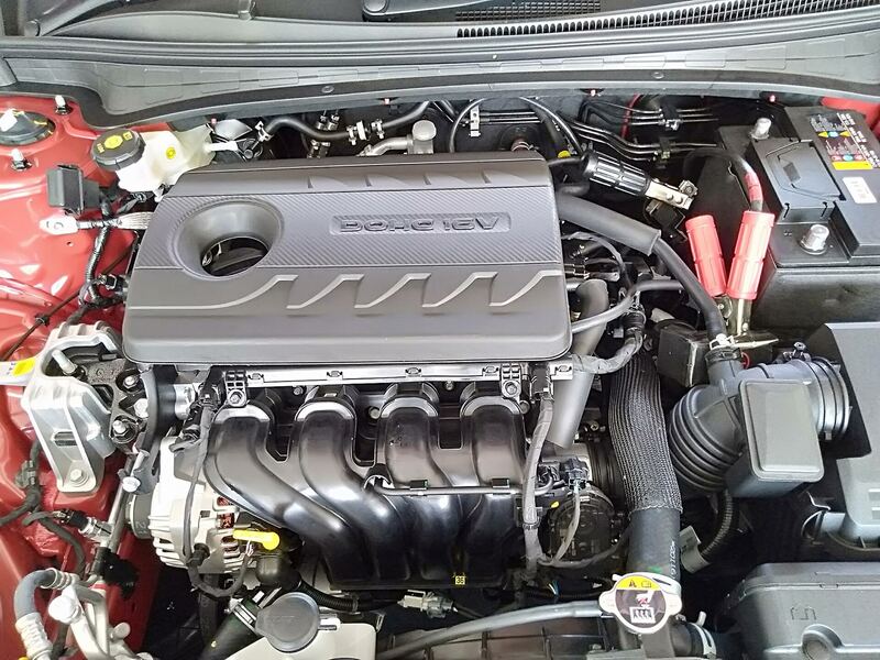 2021 Hyundai Elantra 1.6-liter engine bay with the hood open, black car