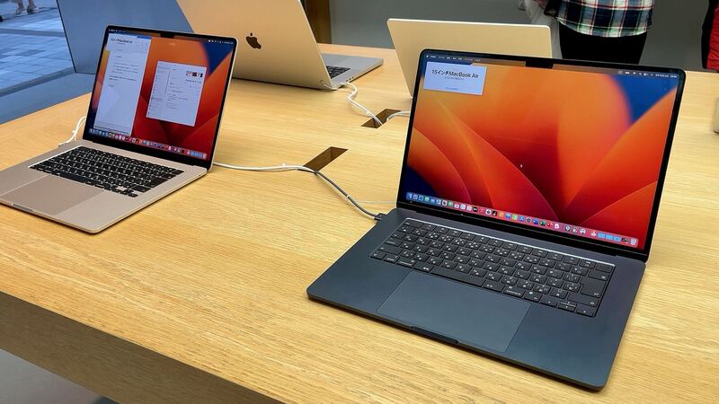 15-inch MacBook Air in midnight and starlight on a store display table