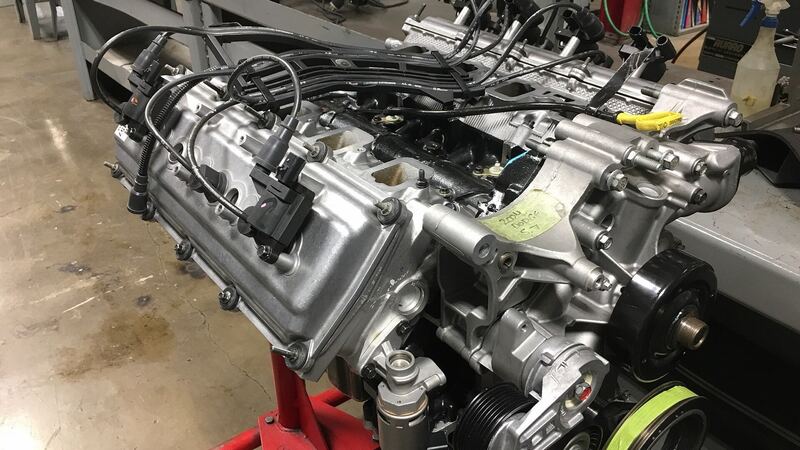 5.7 Hemi V8 on an engine stand with its ignition coils and cylinder heads visible