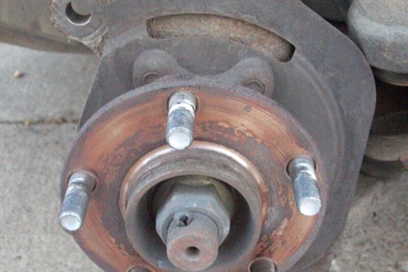 Wheel hub with the brake rotor and caliper removed during a brake job (similar vehicle)