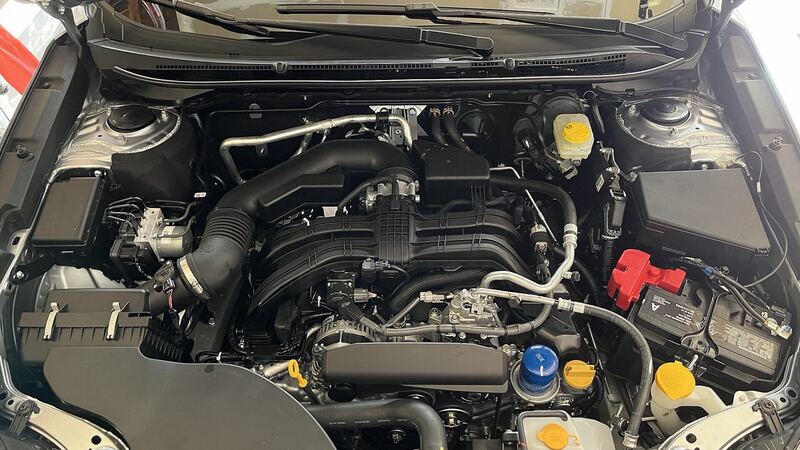 2023 Subaru Outback 2.5-liter four-cylinder engine bay with the hood open